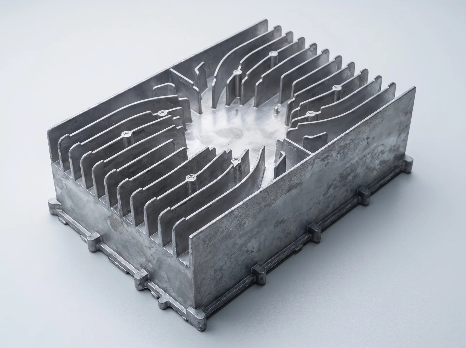 A finned die-cast aluminum housing