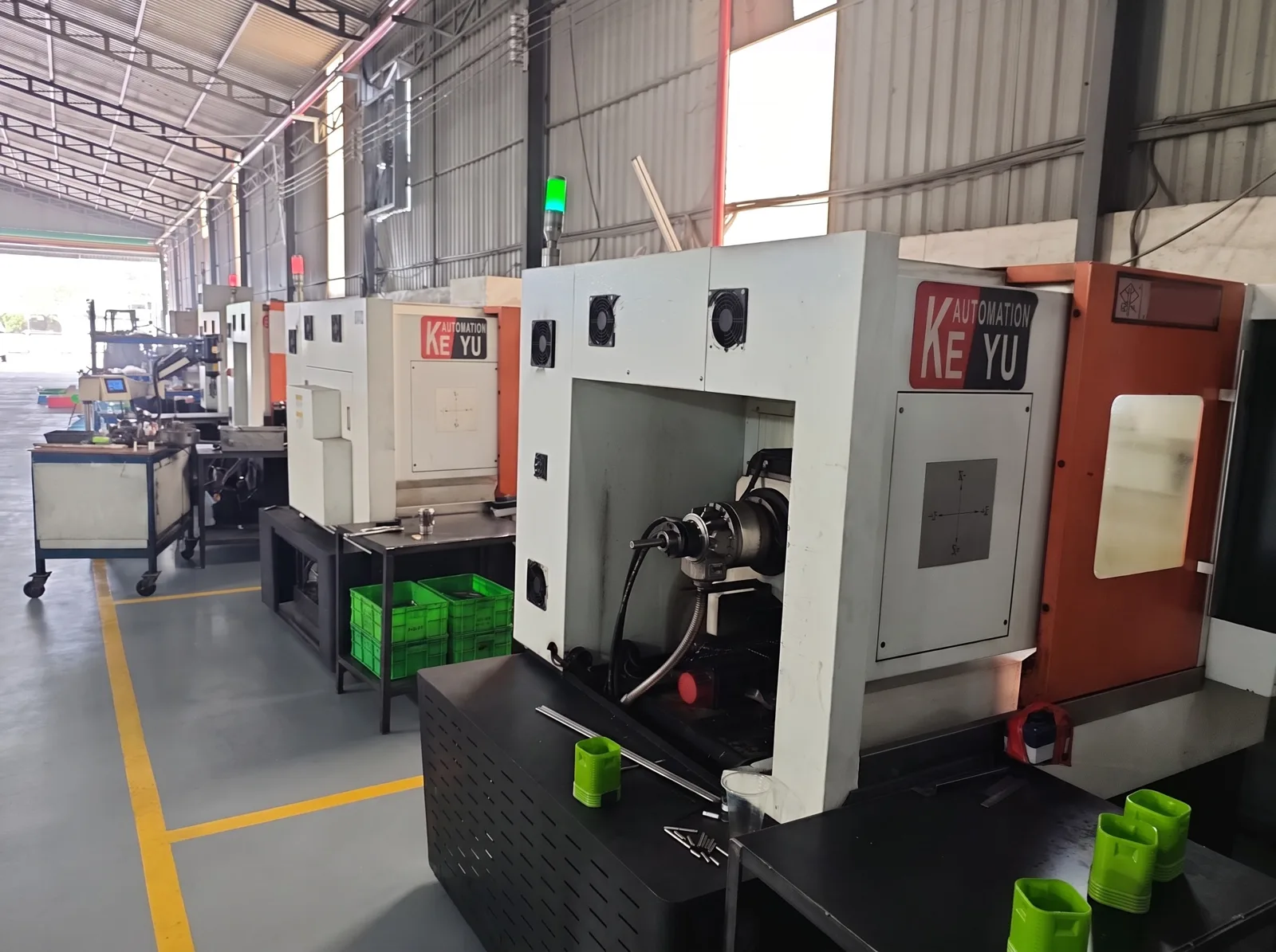 A row of CNC lathes