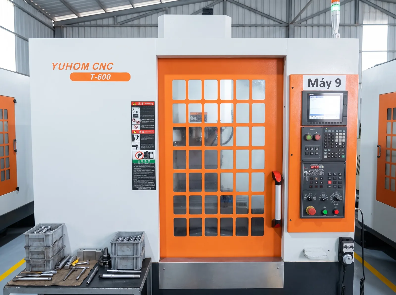 A single vertical machining center with its setup table