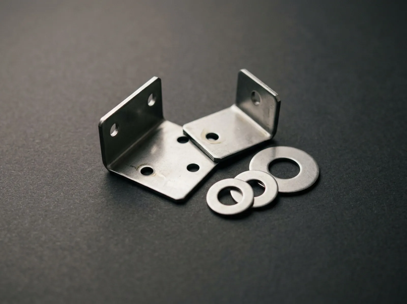 Stamped sheet-steel brackets and washers
